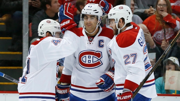 Canadiens players celebrate, The Canadian Press Canadiens players celebrate