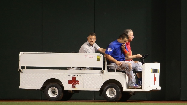 Kyle Schwarber is carted off the field