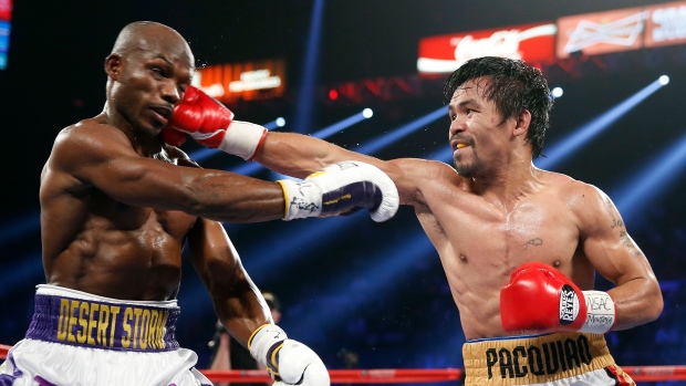 Manny Pacquiao hits Timothy Bradley