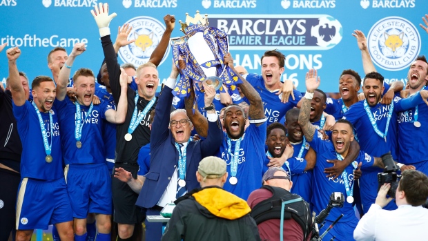 Leicester City celebrates, Plumb Images/Leicester City FC/Getty Images Leicester City celebrates