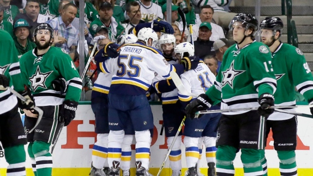 Blues celebrate vs. Stars