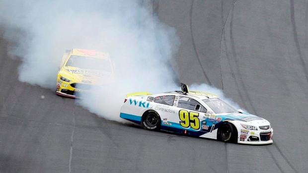 Michael McDowell spins in front of Brian Scott