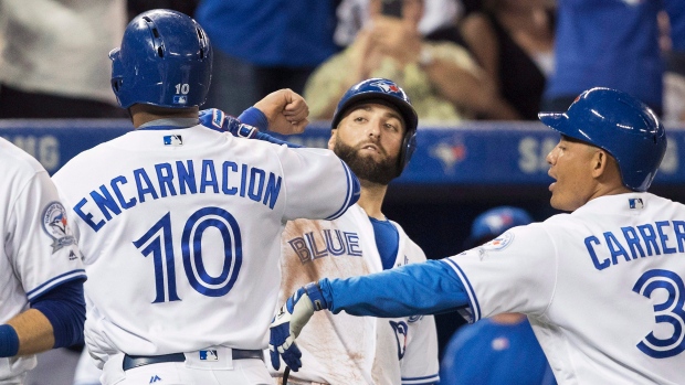 Edwin Encarnacion and Blue Jays Celebrate, The Canadian Press Edwin Encarnacion and Blue Jays Celebrate
