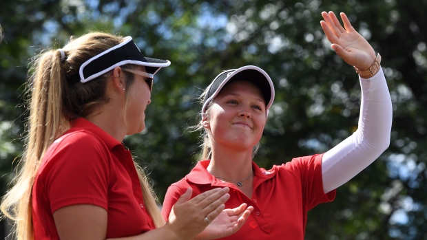 Brooke Henderson and sister/caddie Brittany Henderson