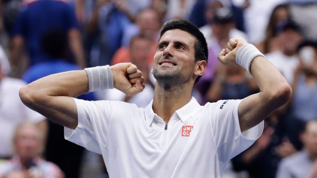 Novak Djokovic reacts to advancing to U.S. Open final