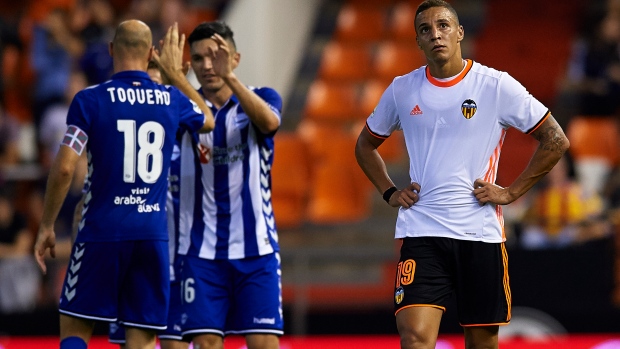 Valencia players celebrate, Manuel Queimadelos Alonso/Getty Images Valencia players celebrate