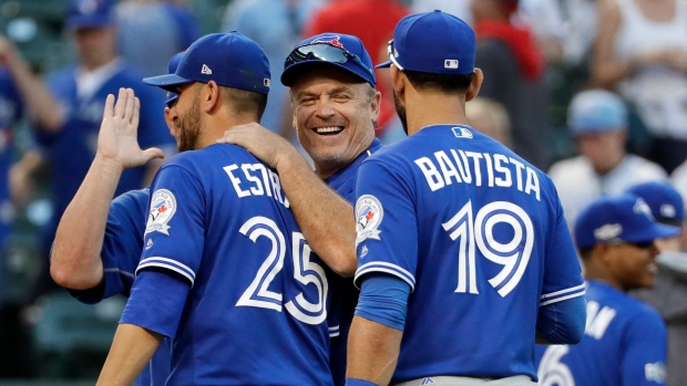 Gibbons, Estrada and Bautista, The Canadian Press Gibbons, Estrada and Bautista