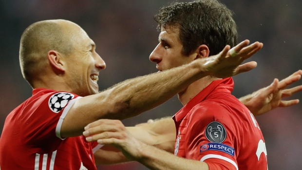 Robben and Muller, The Canadian Press Robben and Muller