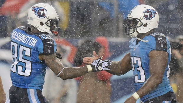 Ken Whisenhunt wins his Tennessee debut as Titans rally to beat Packers 20-16 in rain Article Image 0