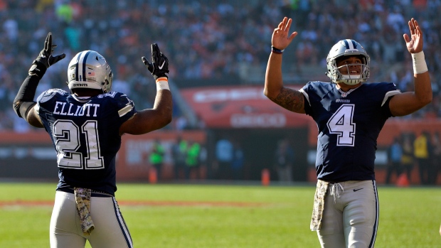 Ezekiel Elliott and Dak Prescott, The Canadian Press Ezekiel Elliott and Dak Prescott