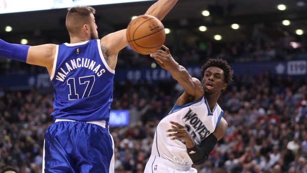 Jonas Valanciunas and Andrew Wiggins, Tom Szczerbowski/Getty Images Jonas Valanciunas and Andrew Wiggins