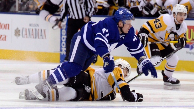 Leo Komarov and Bryan Rust, The Canadian Press Leo Komarov and Bryan Rust