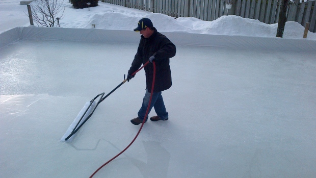 Darren Dreger working on outdoor rink