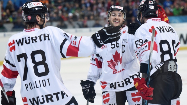 Team Canada celebrates, The Canadian Press Team Canada celebrates