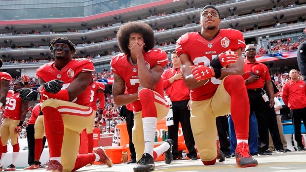 Eli Harold, Colin Kaepernick and Eric Reid