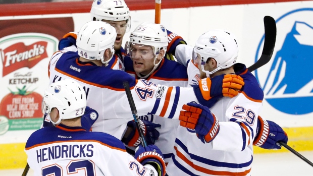 Oilers players celebrate