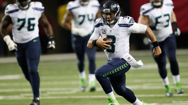 Russell Wilson, The Canadian Press Russell Wilson