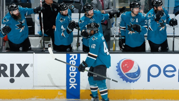 Joel Ward, Sharks celebrate, Don Smith/National Hockey League/Getty Images Joel Ward, Sharks celebrate