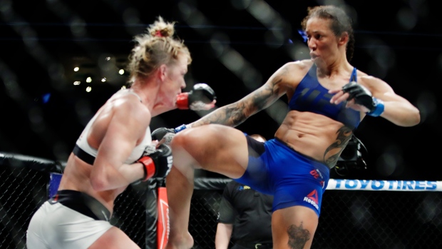 Germaine de Randamie kicks Holm, The Canadian Press Germaine de Randamie kicks Holm