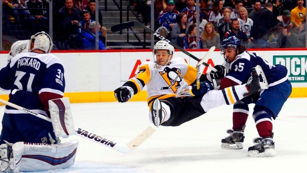 Bryan Rust checked by Mark Barberio, The Canadian Press Bryan Rust checked by Mark Barberio