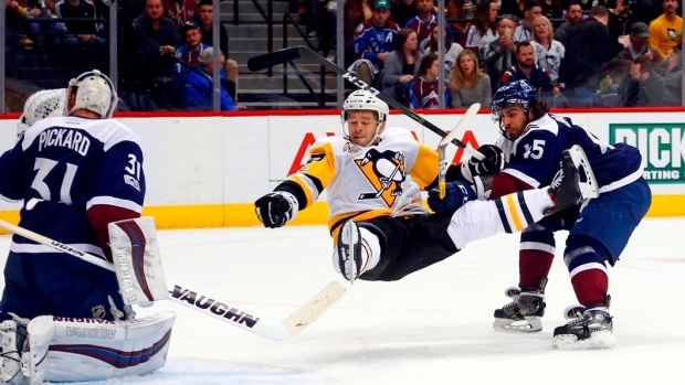 Bryan Rust checked by Mark Barberio