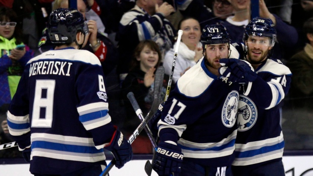 Werenski, Dubinsky and Jenner celebrate, The Canadian Press Werenski, Dubinsky and Jenner celebrate