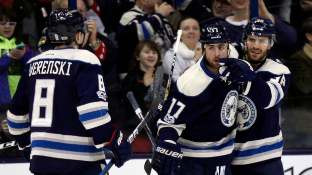 Werenski, Dubinsky and Jenner celebrate