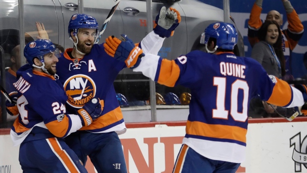 Gionta, Ladd and Quine celebrate