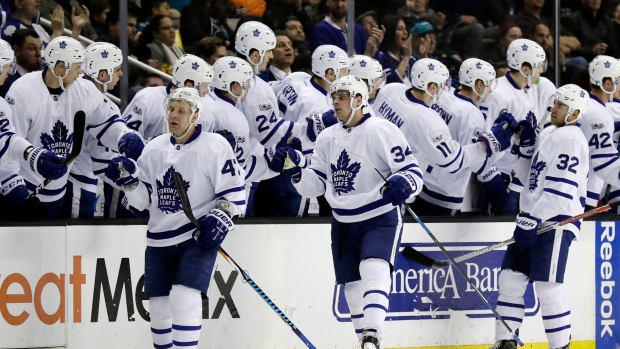Komarov, Matthews and Leivo celebrate, The Canadian Press Komarov, Matthews and Leivo celebrate