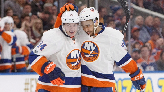 Hickey and Ho-Sang celebrate