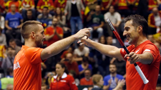 Nenad Zimonjic and Viktor Troicki , The Canadian Press Nenad Zimonjic and Viktor Troicki