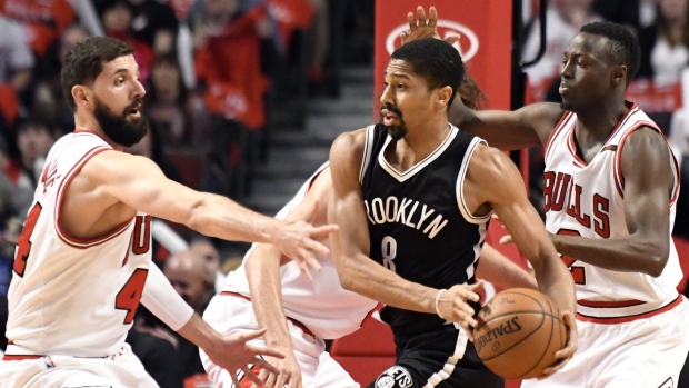 Spencer Dinwiddie, Nikola Mirotic and Jerian Grant