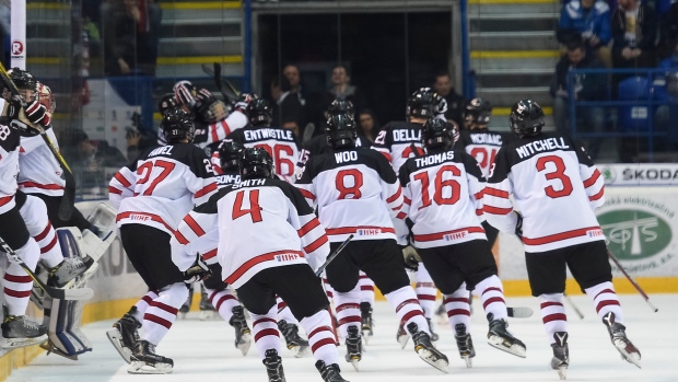 Canada celebrates Stelio Mattheos' goal, IIHF-HHOF/Images on Ice Canada celebrates Stelio Mattheos' goal