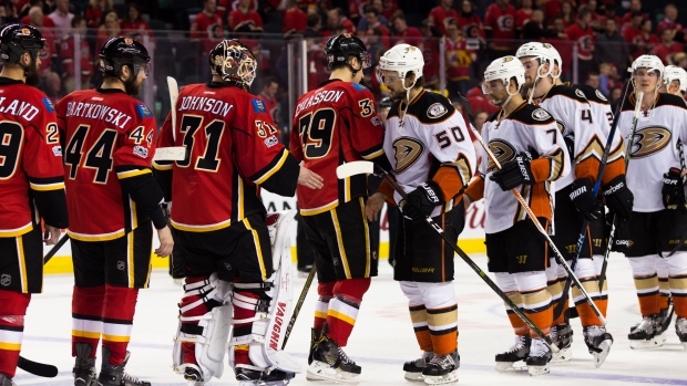 Anaheim Ducks and Calgary Flames shake hands, Icon Sportswire/Icon Sportswire/Getty Images Anaheim Ducks and Calgary Flames shake hands