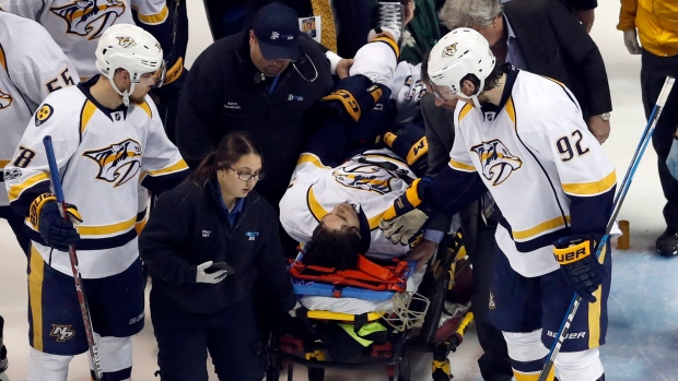Kevin Fiala taken off on stretcher, The Canadian Press Kevin Fiala taken off on stretcher