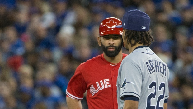 Jose Bautista and Chris Archer , Rick Madonik/Toronto Star/Getty Images Jose Bautista and Chris Archer