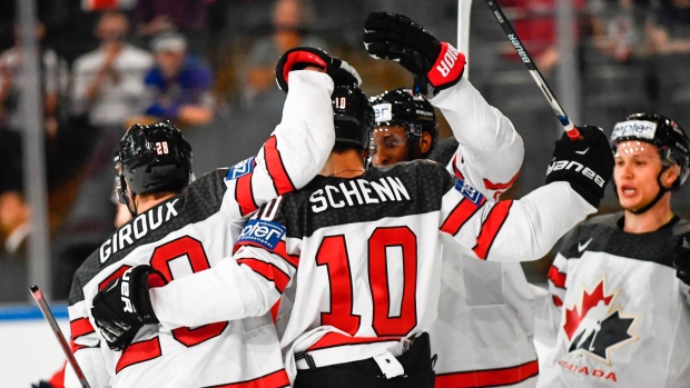 Canada's players celebrate