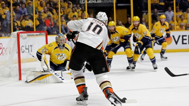 Corey Perry and Pekka Rinne, The Canadian Press Corey Perry and Pekka Rinne