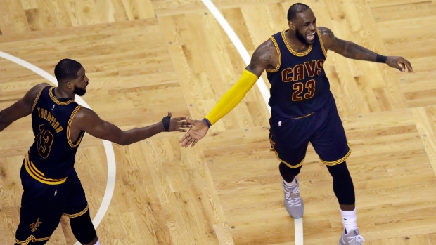 Tristan Thompson and LeBron James celebrate