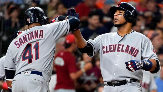 Carlos Santana and Edwin Encarnacion, The Canadian Press Carlos Santana and Edwin Encarnacion