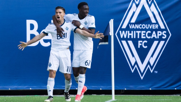 Nicolas Mezquida and Alphonso Davies, The Canadian Press Nicolas Mezquida and Alphonso Davies