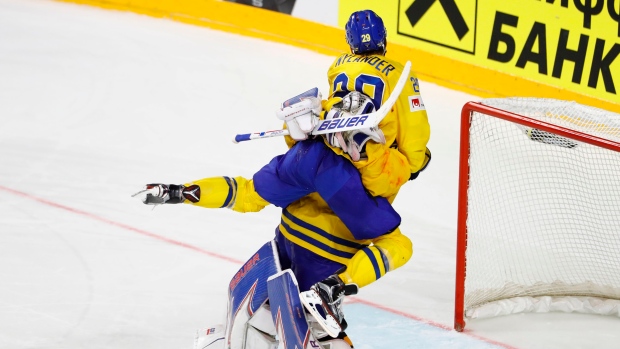 William Nylander tackles Henrik Lundqvist