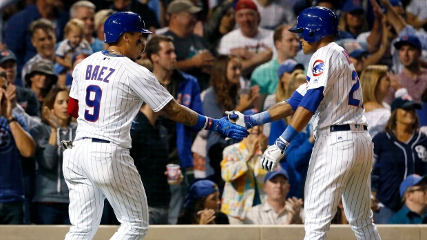 Javier Baez, Addison Russell, The Canadian Press Javier Baez, Addison Russell