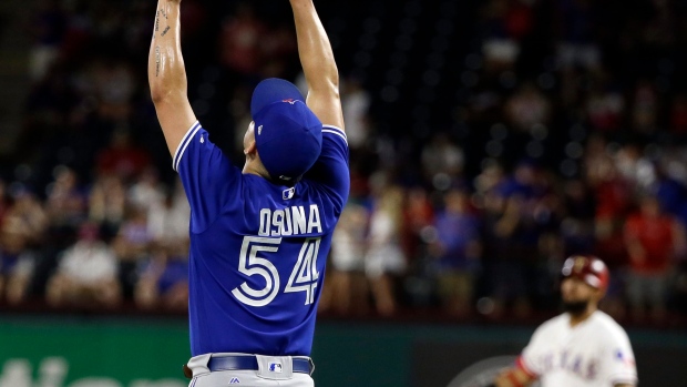 Roberto Osuna celebrates, The Canadian Press Roberto Osuna celebrates