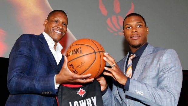 Kyle Lowry and Masai Ujiri, Colin McConnell/Toronto Star/Getty Images Kyle Lowry and Masai Ujiri