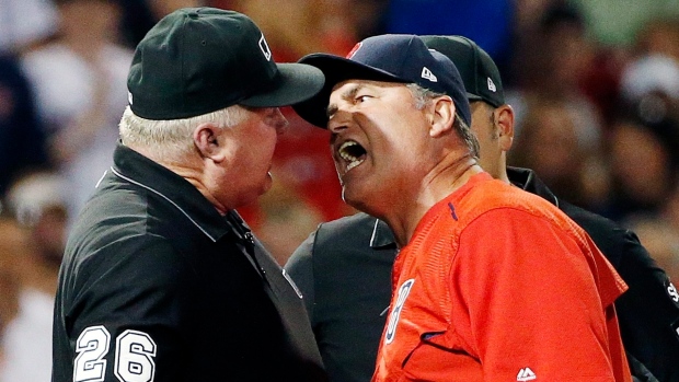 John Farrell argues with umpire