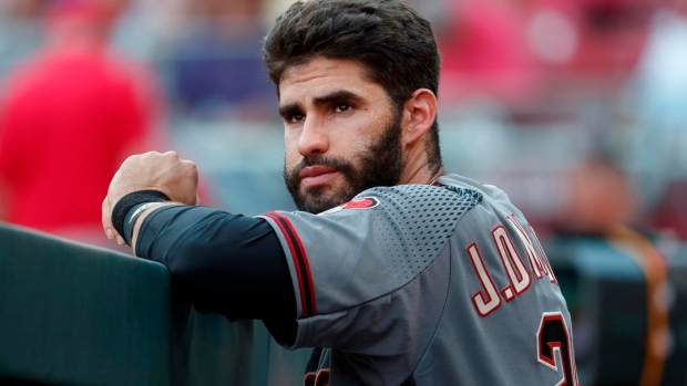 OF J.D. Martinez hurts left hand in debut with Diamondbacks Article Image 0