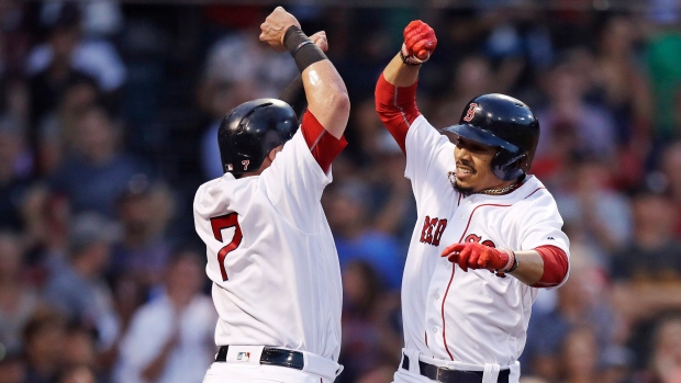 Christian Vazquez and Mookie Betts celebrate