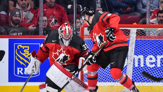 Carter Hart and Dante Fabbro, Minas Panagiotakis/Getty Images Carter Hart and Dante Fabbro