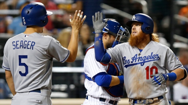 Cory Seager and Justin Turner celebrate